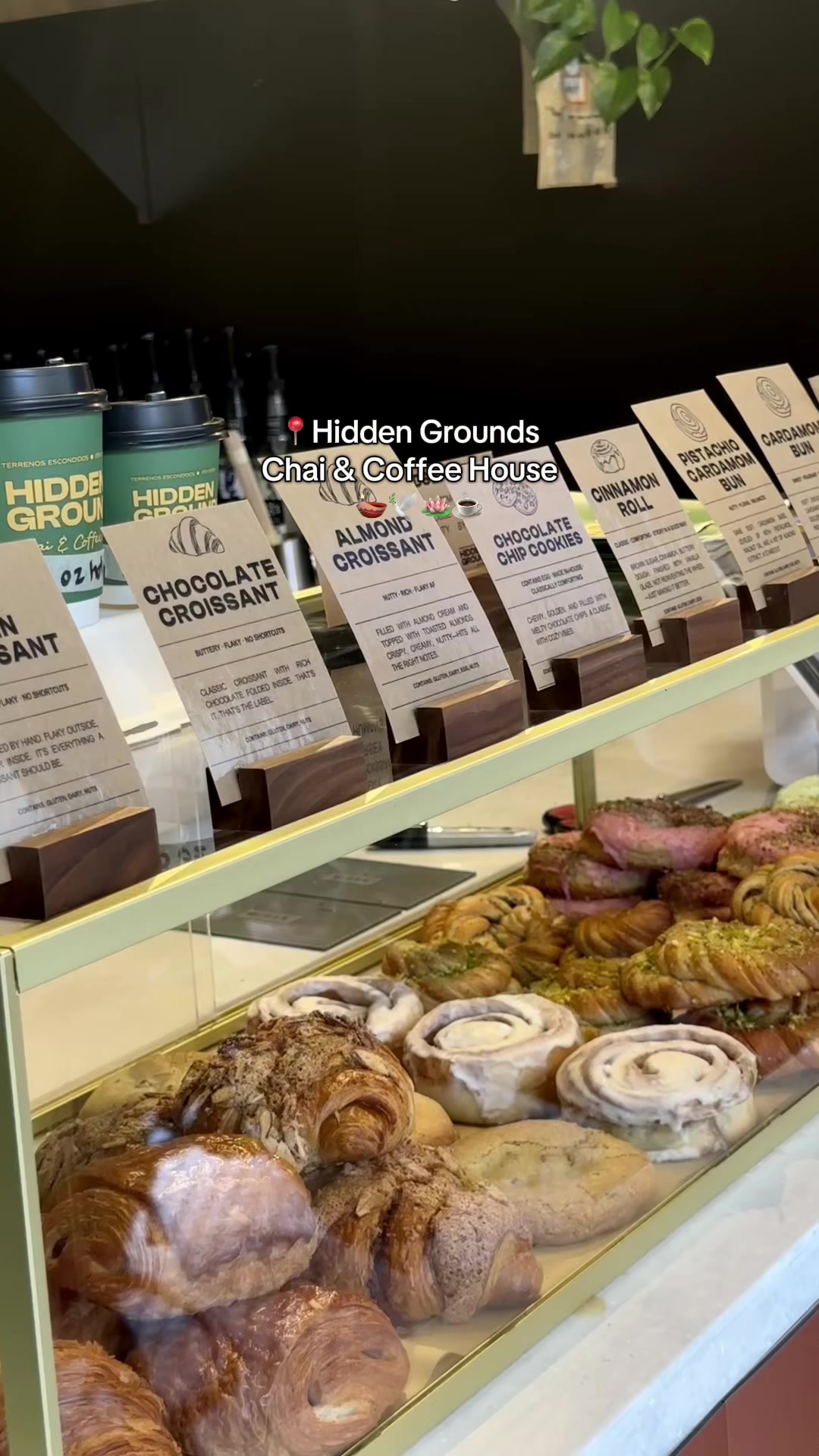 @Hidden Grounds is a cozy cafe that serves unique chai, coffee, matcha and delicious pastries across NYC & NJ. 

We got:
☕️ HG brown sugar brew
🍵Taro matcha 
💚Pistachio donut 
🌹Rose donut
🥯 Bombay bagel sandwich 
🥐 Cardamom bun

We visited the east village location 
📍 36 3rd Ave, New York, NY 10003

#cafe #desi #chai #nycfood #nycrecs #nyccafe #eastvillageeats #coffeetok #chailover 